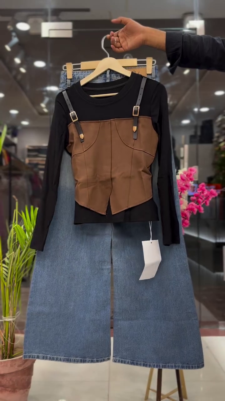 Urban Chic Black Long Sleeve Top with Structured Ivory Corset Overlay & Buckle Strap Detailing Paired with High-Waist Blue Denim Midi Skirt Co-Ord Set for Women 👗✨