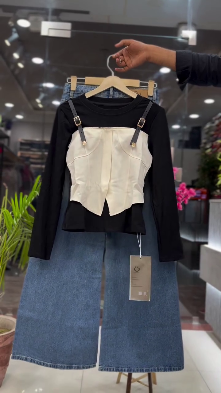 Urban Chic Black Long Sleeve Top with Structured Ivory Corset Overlay & Buckle Strap Detailing Paired with High-Waist Blue Denim Midi Skirt Co-Ord Set for Women 👗✨