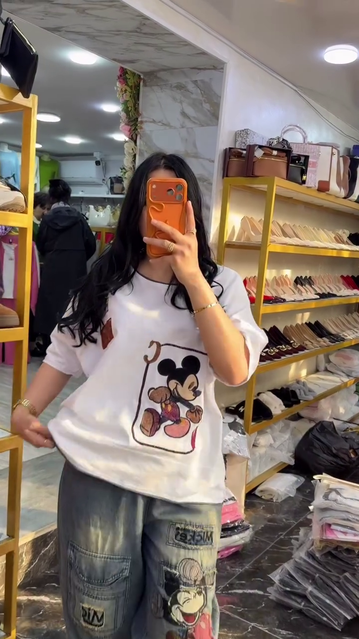 👕Trendy Cartoon Graphic Oversized T-Shirt with Relaxed Fit Denim Jogger Jeans Combo for Women ✨🤍👖