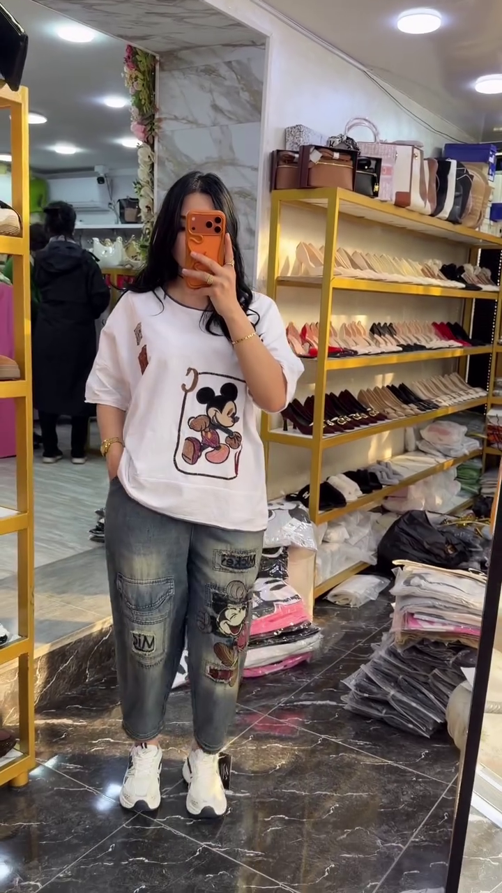 👕Trendy Cartoon Graphic Oversized T-Shirt with Relaxed Fit Denim Jogger Jeans Combo for Women ✨🤍👖