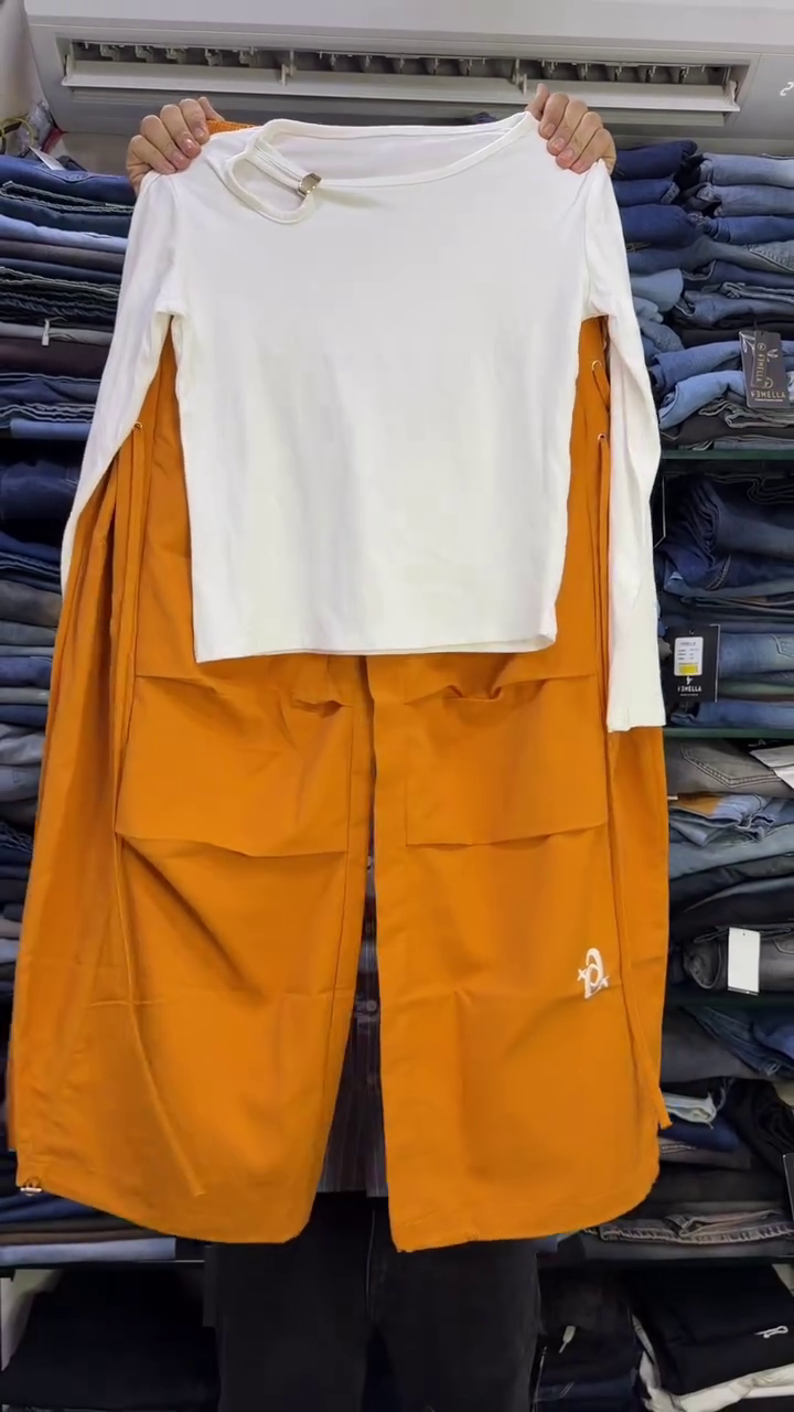 Minimalist White Long-Sleeve Cutout Top Paired With Mustard Yellow Cargo Pants 🤍🟡✨