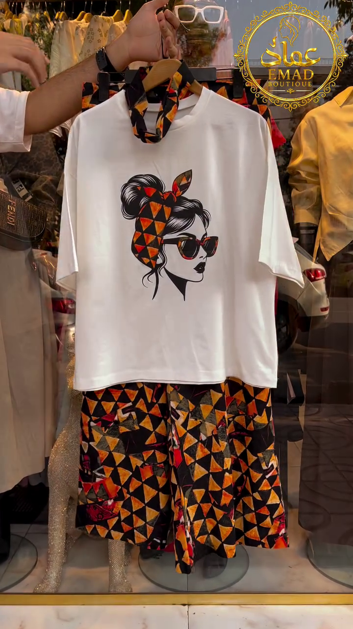 🖤 Chic White Graphic T-Shirt with Artistic Face Print Paired with Patterned Ethnic Short