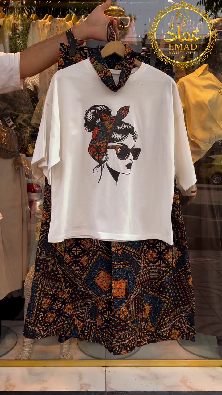 🖤 Chic White Graphic T-Shirt with Artistic Face Print Paired with Patterned Ethnic Short