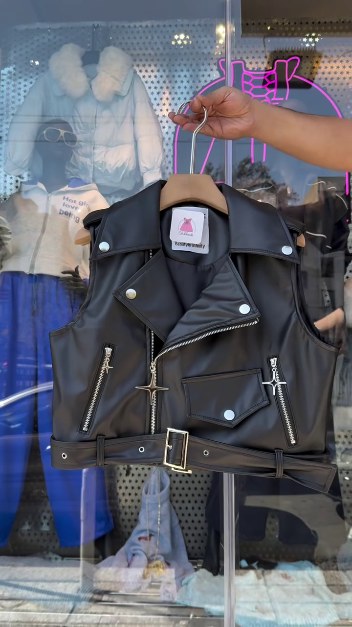 Chic Dark Brown Faux Leather Biker Vest Featuring Asymmetric Silver-Tone Zippers, Studded Lapels, and an Adjustable Buckled Hem Belt